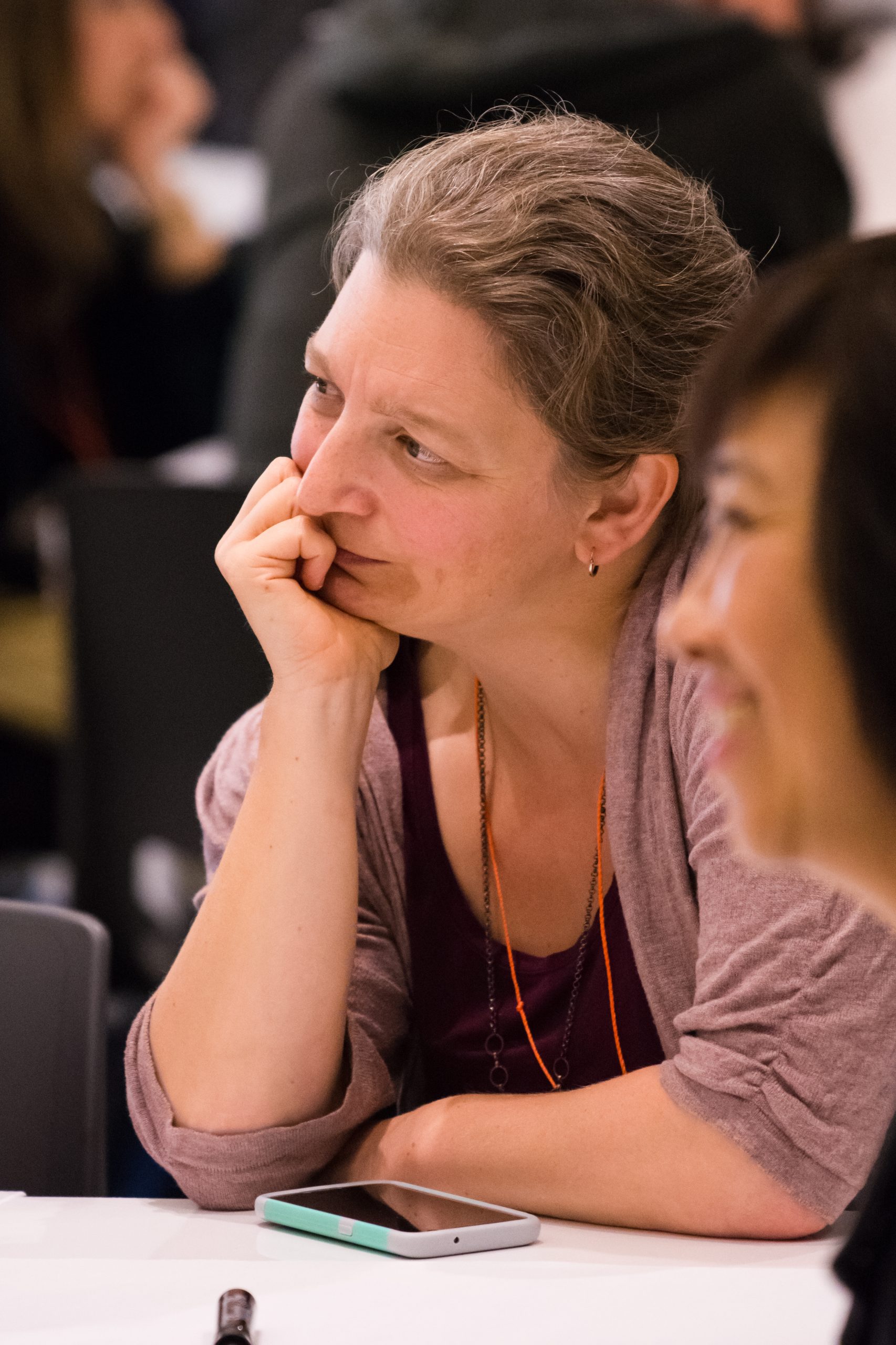 Profile picture of Amy Severson holding her chin in her hand, thinking deeply.