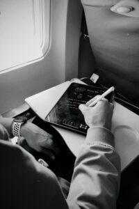 person taking notes on an ipad using a digital pen