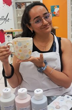 Charu exploring pottery painting