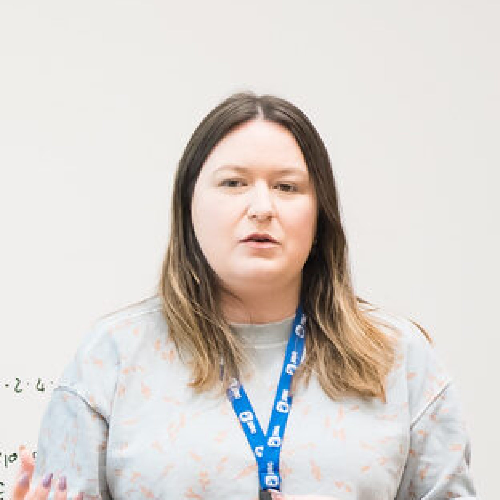 headshot of Kelsea Perry teaching a workshop